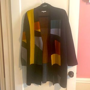 Black color block long sweater. No buttons, rolled shawl collar. Size L